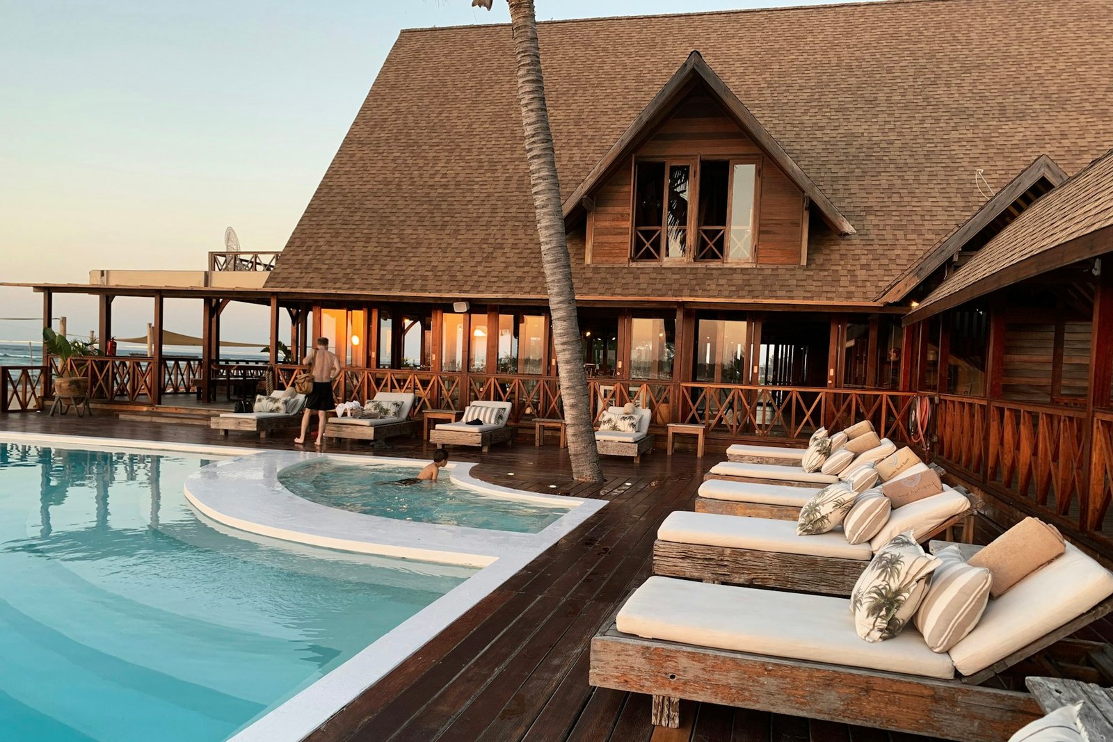 Luxury lifestyle — private poolside at golden hour